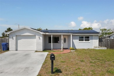 Beach Home For Sale in Holiday, Florida