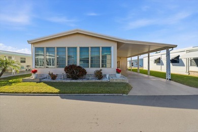 Beach Home For Sale in Holiday, Florida