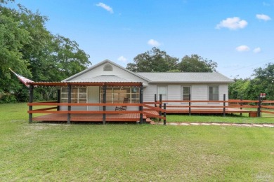 Beach Home For Sale in Pace, Florida