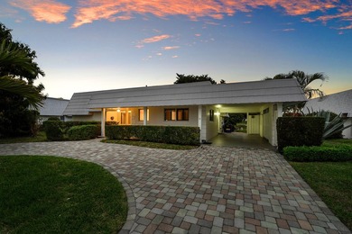 Beach Home For Sale in Atlantis, Florida