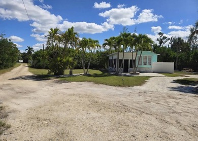 Beach Home For Sale in Bokeelia, Florida