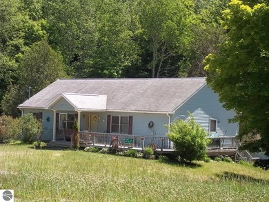 Beach Home For Sale in Cedar, Michigan