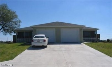 Beach Townhome/Townhouse For Sale in Lehigh Acres, Florida