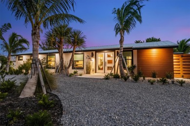 Beach Home For Sale in Holmes Beach, Florida