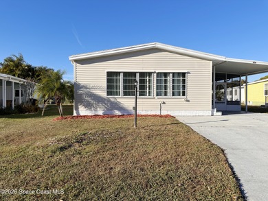 Beach Home For Sale in Barefoot Bay, Florida