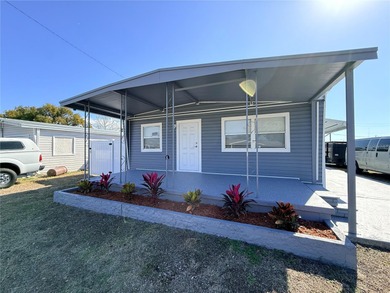 Beach Home For Sale in Holiday, Florida