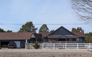 Welcome to this beautifully crafted home in Nahma, where - Beach Home for sale in Rapid River, Michigan on Beachhouse.com