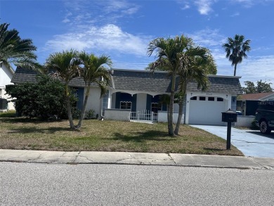 Beach Home For Sale in Holiday, Florida