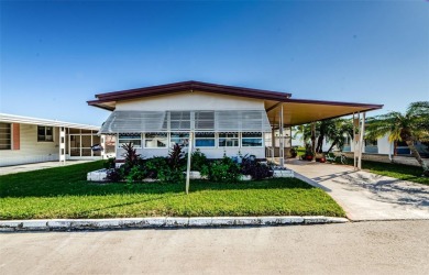 Beach Home For Sale in Holiday, Florida