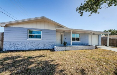 Beach Home For Sale in Holiday, Florida