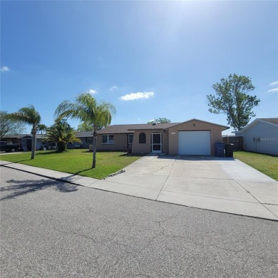 Beach Home For Sale in Holiday, Florida