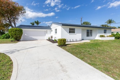 Beach Home For Sale in Lake Clarke Shores, Florida