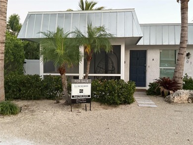 Beach Townhome/Townhouse For Sale in Holmes Beach, Florida