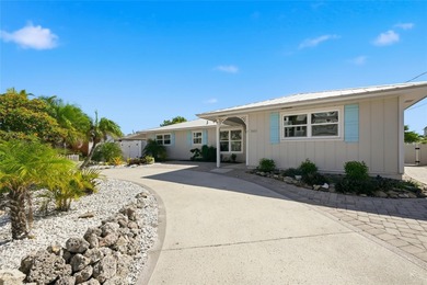 Beach Home For Sale in Holmes Beach, Florida