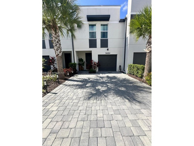 Beach Townhome/Townhouse For Sale in Mangonia Park, Florida
