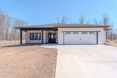 Beach Home For Sale in Manistique, Michigan