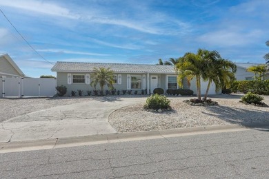 Beach Home For Sale in Holmes Beach, Florida