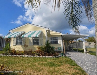 Beach Home For Sale in Barefoot Bay, Florida