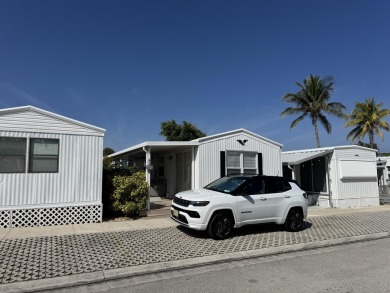 Beach Home For Sale in Briny Breezes, Florida