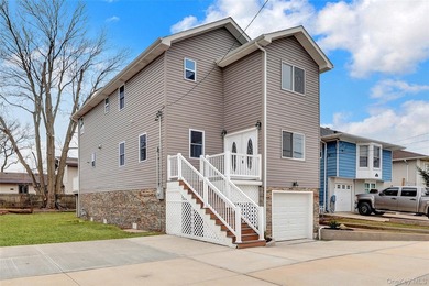 Beach Home For Sale in Island Park, New York