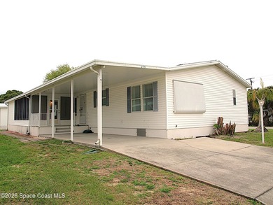 Beach Home For Sale in Barefoot Bay, Florida