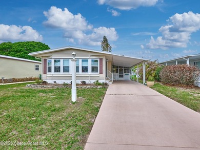 Beach Home For Sale in Barefoot Bay, Florida