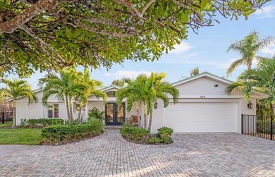 Beach Home For Sale in Holmes Beach, Florida