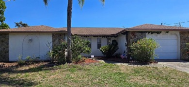 Beach Home For Sale in Holiday, Florida