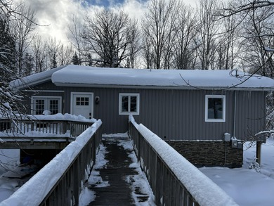 Beach Home For Sale in Cedarville, Michigan