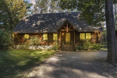 Beach Home For Sale in Brutus, Michigan