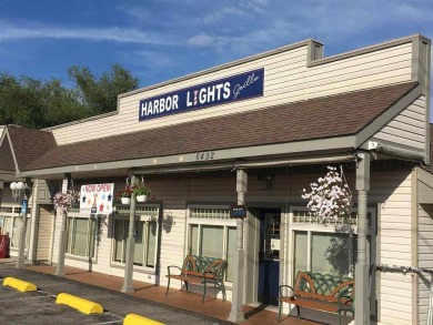 Beach Commercial For Sale in Carp Lake, Michigan