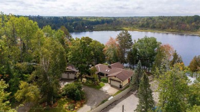 Beach Home For Sale in Ocqueoc, Michigan