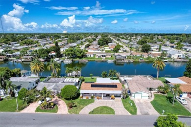 Beach Home For Sale in Holiday, Florida