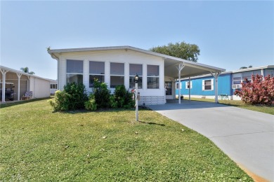 Beach Home For Sale in Barefoot Bay, Florida