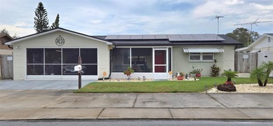 Beach Home For Sale in Holiday, Florida