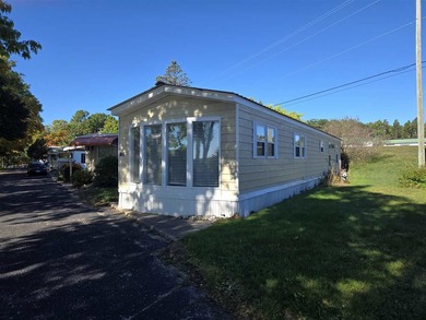 Beach Home For Sale in Charlevoix, Michigan