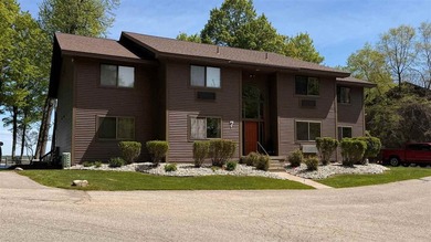 Beach Condo For Sale in Kewadin, Michigan
