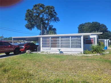 Beach Home For Sale in Holiday, Florida