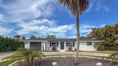 Beach Home For Sale in Holmes Beach, Florida