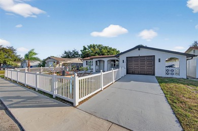 Beach Home For Sale in Holiday, Florida