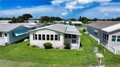 Beach Home For Sale in Barefoot Bay, Florida