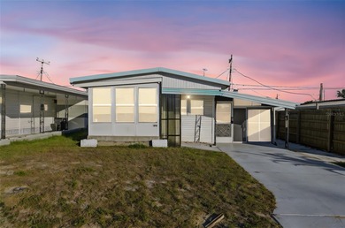 Beach Home For Sale in Holiday, Florida