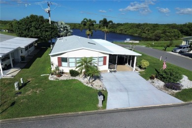 Beach Home For Sale in Barefoot Bay, Florida