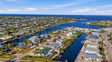 Beach Home For Sale in Holmes Beach, Florida