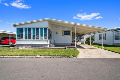 Beach Home For Sale in Holiday, Florida