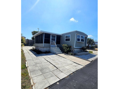 Beach Home For Sale in Tarpon Springs, Florida