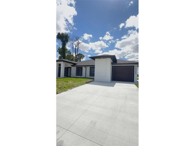 Beach Townhome/Townhouse For Sale in Lehigh Acres, Florida