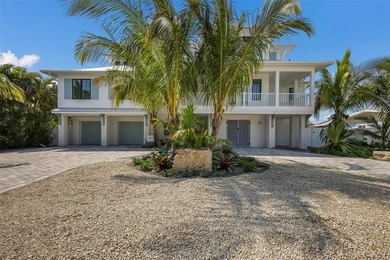 Beach Home For Sale in Holmes Beach, Florida