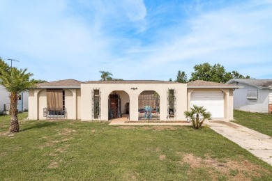 Beach Home For Sale in Holiday, Florida