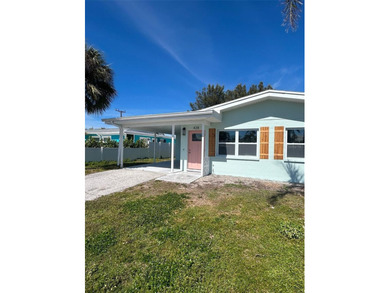 Beach Townhome/Townhouse For Sale in Holmes Beach, Florida